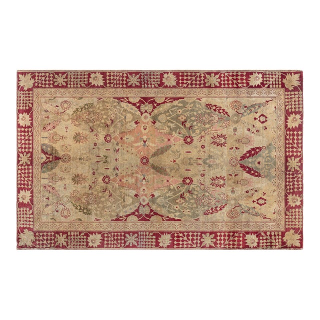 Antique 1880s Turkish Hereke Rug with Floral and Botanical Motifs in Soft Beige, Coral, and Crimson For Sale