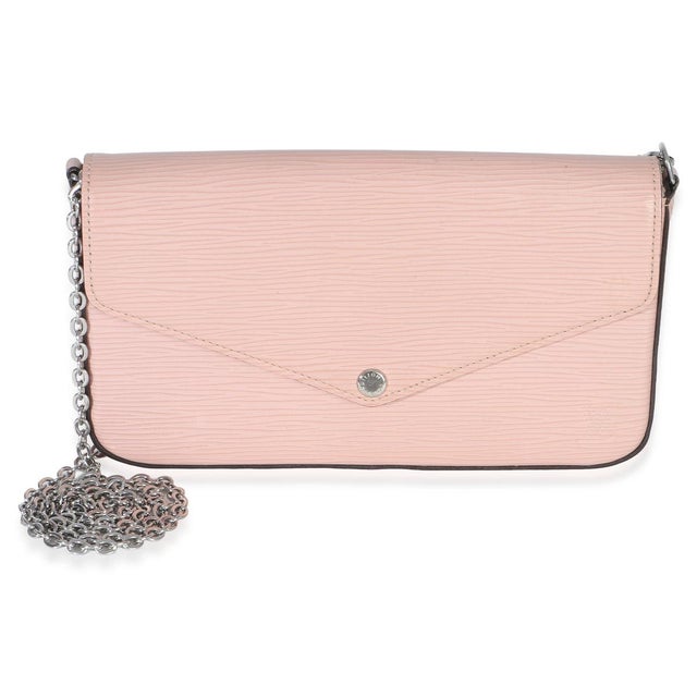 Item #: 153514 Features Interior: Single slot pocket Dimensions: 8.5 x 4.5 x 1.25 in Handbag Closure Type: Snap Strap...