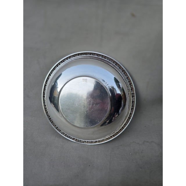 This is a light weight Wallace sterling silver bowl with exquisite pierce work in a fruit and leaf design . This is...