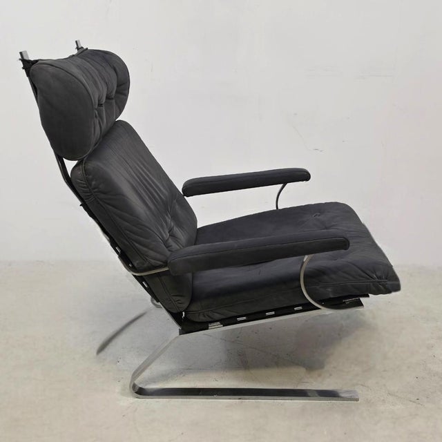 Vintage German Swing Chair in Grey Leather with Chrome, 1970s, in Good conditions. Designed 1970 to 1979
