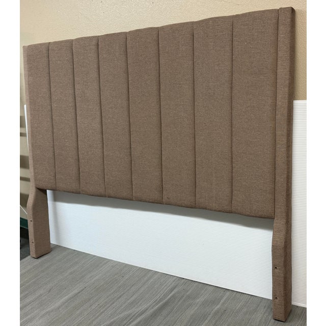 Design Plus Gallery presents a Woven Upholstered Standard King Size Bed Frame. The bed frame has a high profile that will...