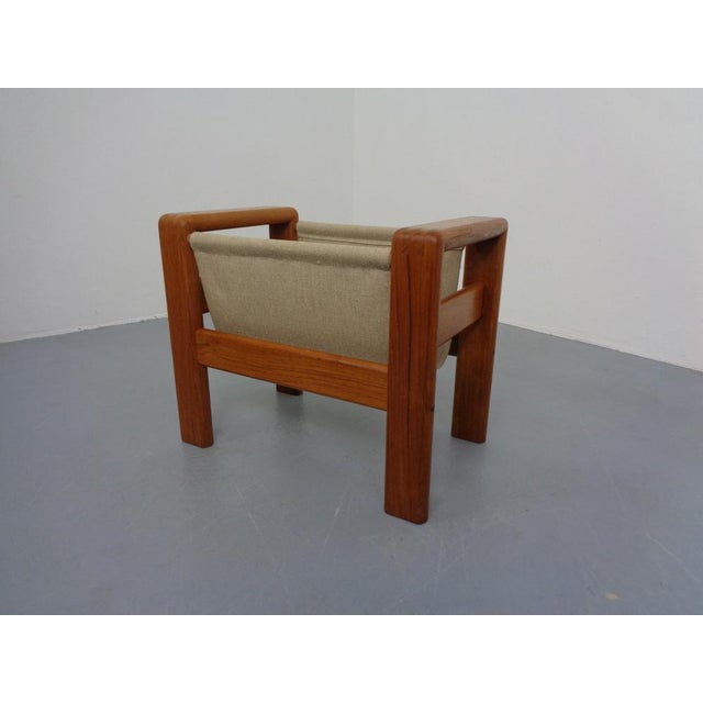 Danish newspaper stand made of solid teak.