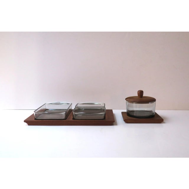 A wood and glass condiments dish with knob lid, Midcentury Danish Modern or Scandinavia Modern design period, circa...