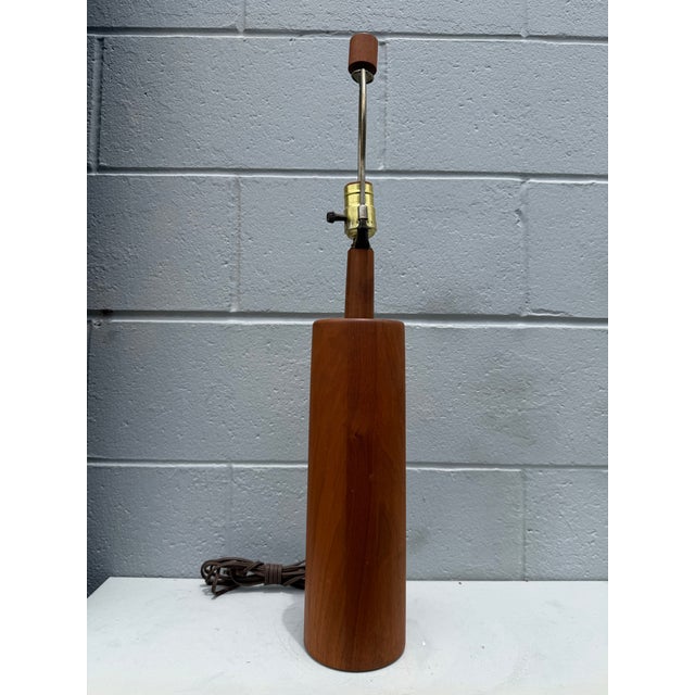 Elevate your space with this iconic Mid-Century Modern table lamp, expertly crafted by the renowned Marshall Studios of...