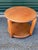 Add a piece of design history to your home with this exceptional (and rare) round side table from the iconic American...