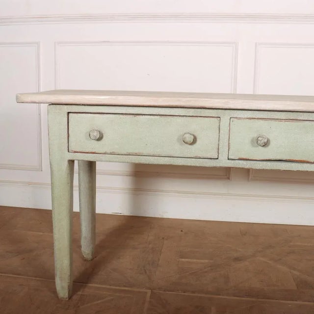 Narrow 19th C English painted pine 3 drawer console / serving table. 1880. This piece is designed in the style of the...