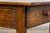 Early 19th century French provincial farmhouse trestle table sourced in Provence, France, featuring a solid elm plank top...