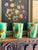 Striking set of six small ceramic cups featuring an expressive hand-glazed finish in rich green, amber, cream, and earthy...