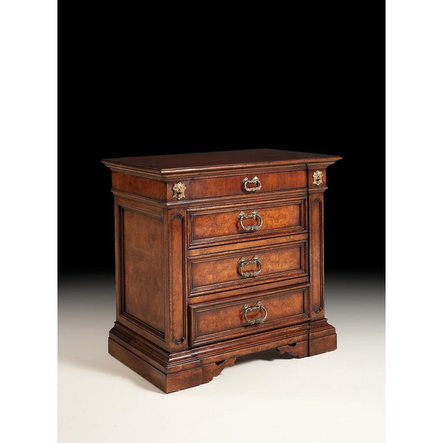 Handcrafted in Italy from solid walnut and walnut burl veneers, this nightstand showcases richly figured wood grain and...