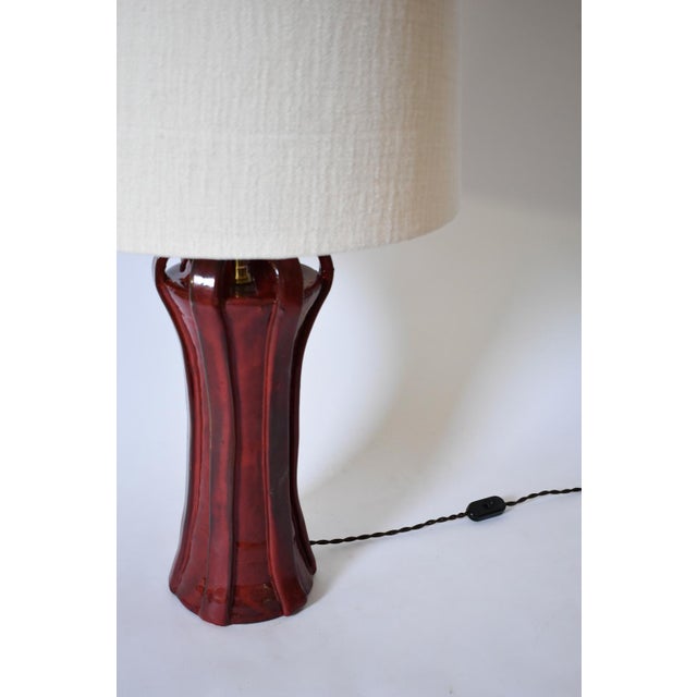 "Kasaï" Henry red ceramic lamp 40cm, Barracuda Edition. "Kasaï" Henri 40cm red ceramic lamp with the shape of a an...