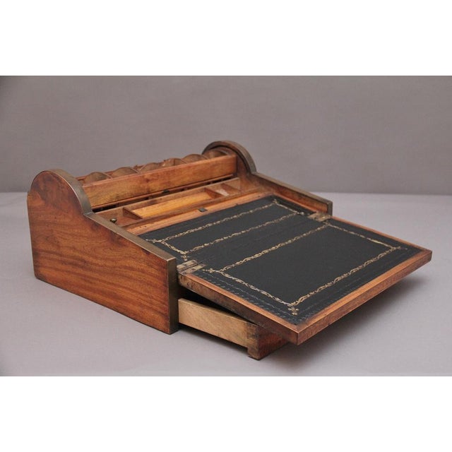 19th Century Chinese camphor wood and brass inlaid writing slope of exceptional quality, having a drawer to the front...