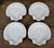 This set of four white ceramic plates was made in Portugal for Williams Sonoma. Each plate is molded in the form of a...