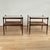Pair of British colonial style tables crafted in mahogany with two caned tiers, one topped with glass, having classic...