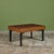 George Nelson expandable coffee table for Herman Miller, c.1950s, USA. The unique table features a stained maple table top...
