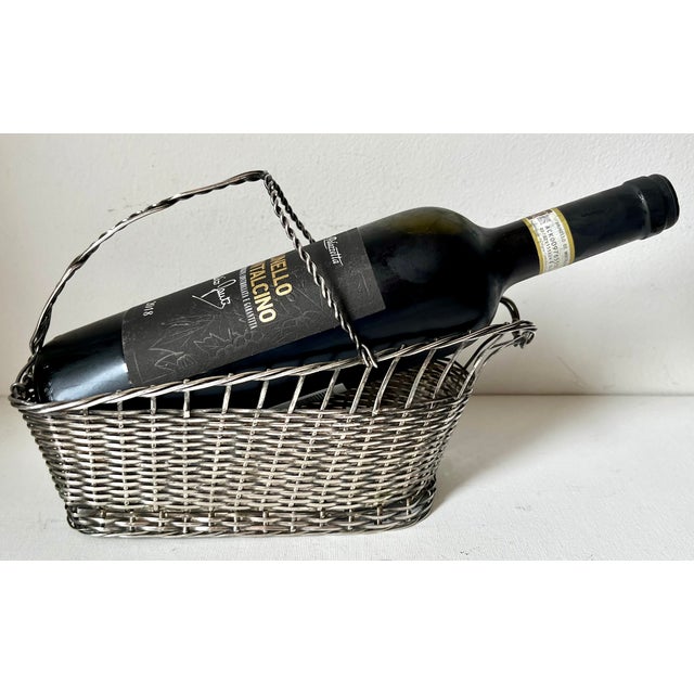 This wonderful vintage French silver-plated mesh bottle basket or caddy, features a woven handle as shown which makes...