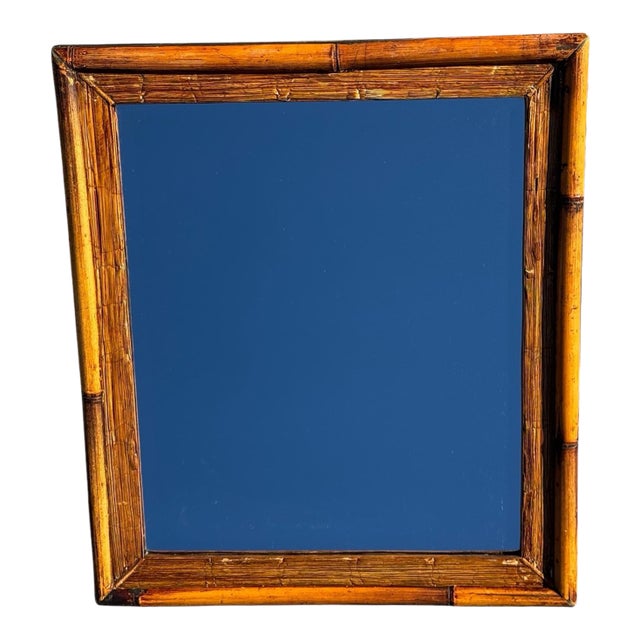 Beautiful simple rattan and bamboo mirror. Can be hung lengthwise or horizontal.