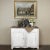 18th Century Country French Provincial Painted Buffet boasts tailored, elegant lines that combine with the distressed...