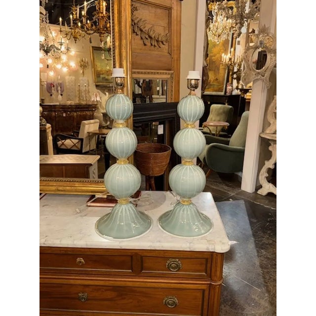 Pair of modern Murano glass pale blue ball lamps. Perfect for today's transitional designs! 23W x 9W