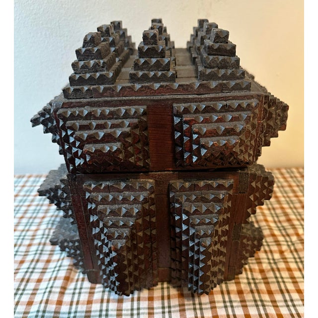 This object is an antique Tramp Art box, a distinct style of American and European folk art. It measures 11.5 inches wide...