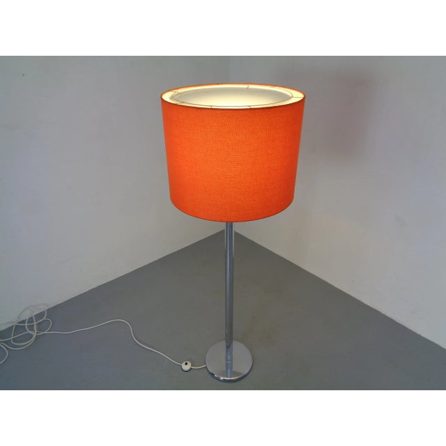 Heavy chrome floor lamp by Staff from the 1960s. Five burning points, of which one is a ceiling floodlight. The lamp is...