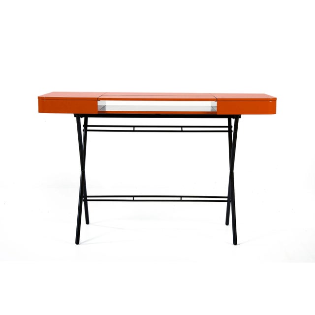 The Cosimo desk was designed by the architect Marco Zanuso Jr for luxury French furniture brand, Adentro Paris. The...
