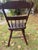 This is an exceptional 19th-century Pennsylvania half-spindle plank-seat side chair, showcasing original, authentic...