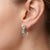 Channel the tranquility and clarity of the deep sea with these oval-cut blue topaz and diamond linear drop earrings. Set...