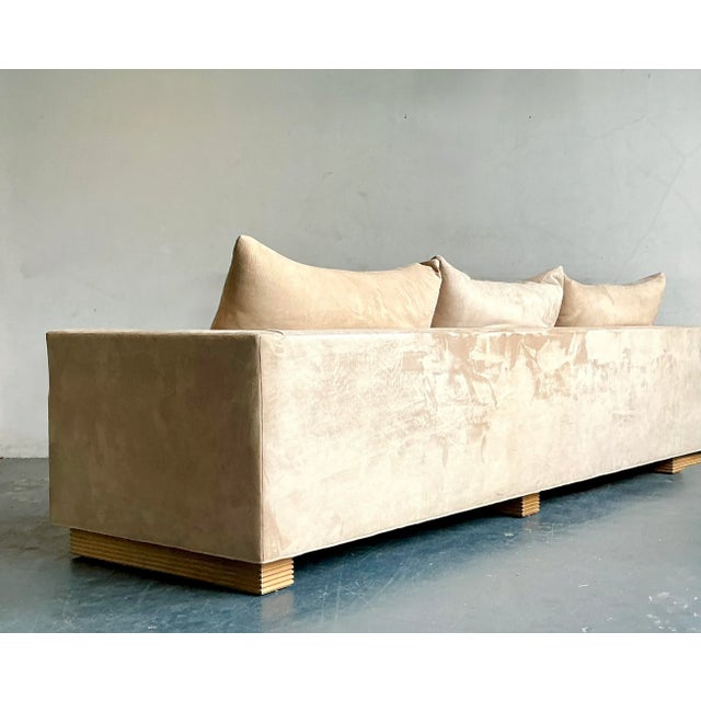 Presenting a luxurious vintage sofa by Tomlinson for Judith Norman, a piece that perfectly marries bohemian comfort with...