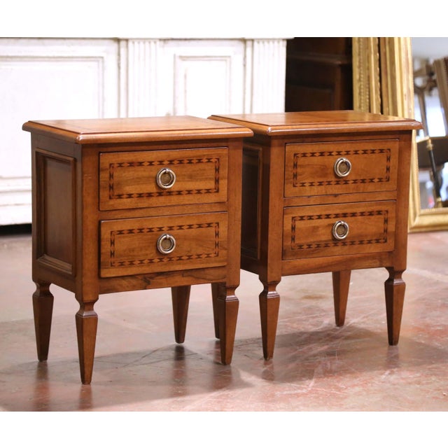 Bring classic refinement to your space with this elegant pair of Louis XVI style nightstands, crafted in France in the...