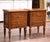Bring classic refinement to your space with this elegant pair of Louis XVI style nightstands, crafted in France in the...