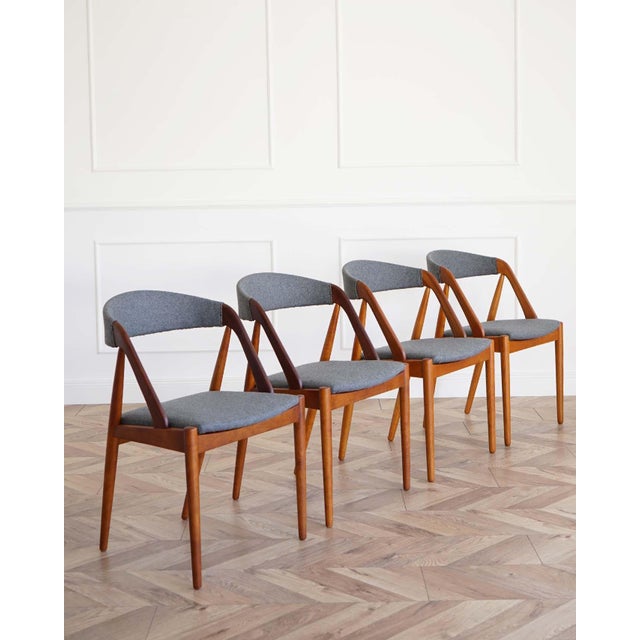 Elegant set of 4 'model 31' dining chairs designed by Kai Kristiansen and manufactured by Schou Andersen, Denmark...