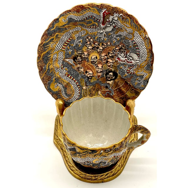 Extraordinary Meiji Satsuma Cup & Saucer, Raised Gilt Enamel Signature, Kozan Zo, Japan, circa 1900s This extraordinary...