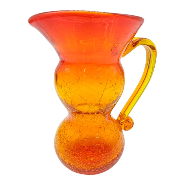 A vessel of fire and fruit, where twilight reds melt into sunlit amber. The glass shivers with crackle—like ice thawing in...