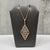 This designer Effy geometric pendant necklace is crafted in 14kt yellow gold and features a modern architectural design...