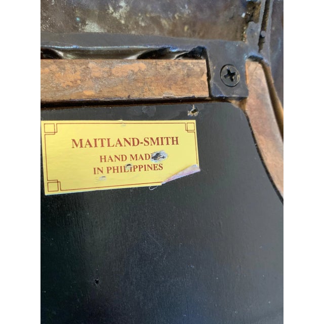 Pair of impressive shield back mirror two-arm sconces by Maitland Smith having neoclassical bronze figural medallion top.