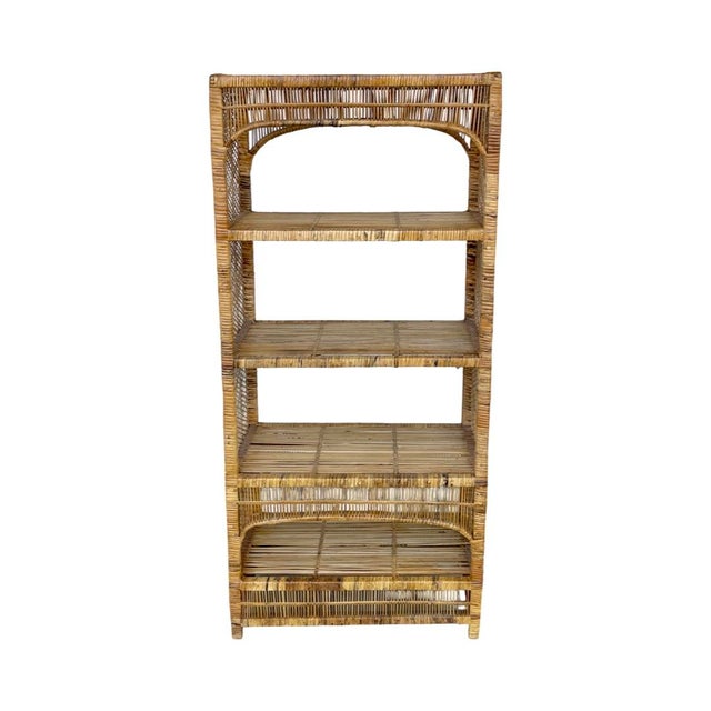 Beautiful coastal rattan wrapped matching bookshelf/etagere pair. Both pieces are in excellent vintage condition with some...