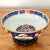 Imari style decorative bowl with brass stand. Includes wooden hand carved base. Marked Hand-Painted. I ship quickly and...