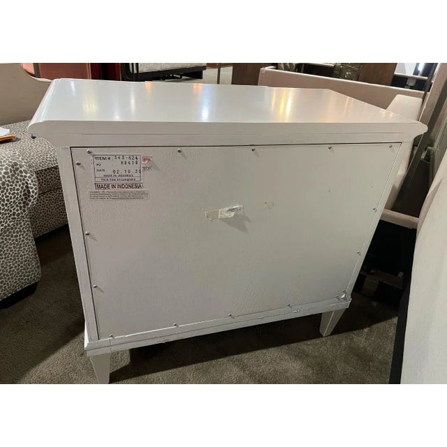 Elevate your bedside with the Tommy Bahama Tuckers Point Three Drawer Nightstand, a refined blend of coastal charm and...