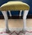 Interesting stool with chartreuse chenille seat, nailhead trim surround, and a white painted horse leg base. A couple of...