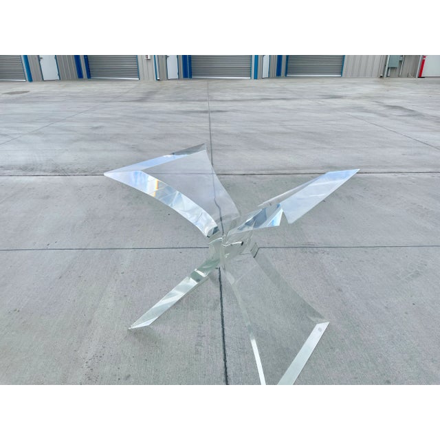 Vintage lucite console table base styled after Lion in Frost in the United States circa 1970s. This fantastic console...