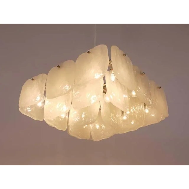 A very beautiful chandelier, manufactured by Kalmar Austria in the 1960s. Stunning design, the chandelier has 24 square...