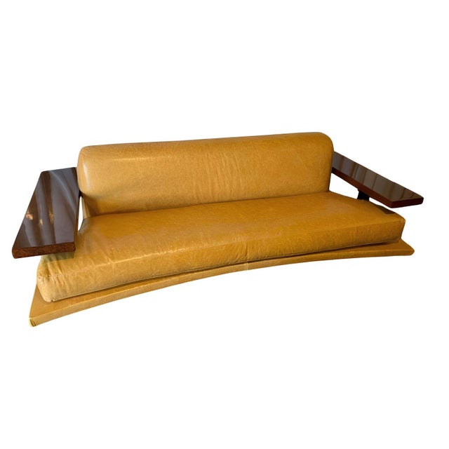 A striking American Art Deco–style sofa dating to the late 20th century, showcasing bold architectural form and refined...
