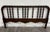 This is an antique Victorian Jenny Lind-style full-size headboard featuring a continuous bobbin-turned top rail, rows of...