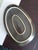 An easy to clean oval shaped plate with glazed mocha brown finish. High quality construction measuring 14x9x1.5 inches....