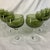These are vintage Sasaki Coronation Green (Hawthorne/Avocado) crystal wine and champagne glasses featuring distinctive...