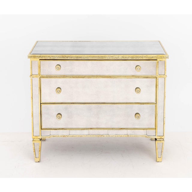 Horchow "Amelie" Mirrored Silvered Wood Dresser, gilt decorated trim, four drawers, on four tapered legs. 35" H x 42.25" W...