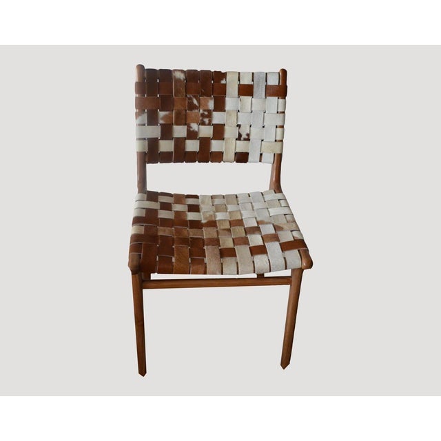 Premium quality double-back woven cowhide with teak frame. Introducing the Premium Quality Cowhide Chair in the new...