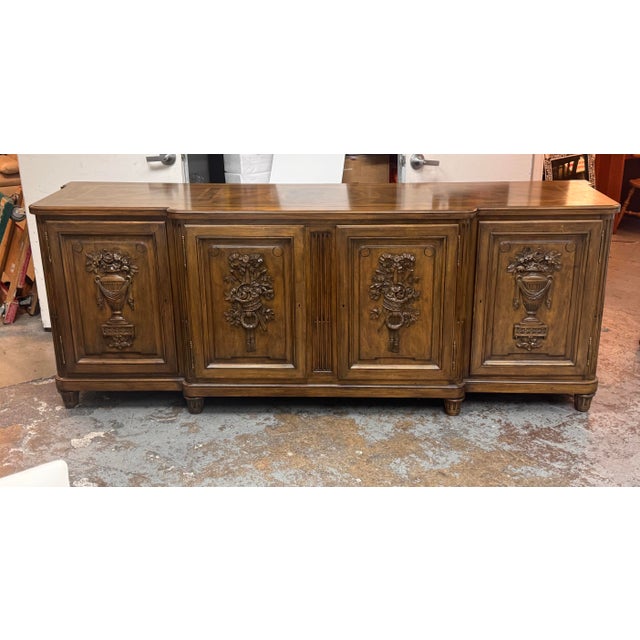 Design Plus Gallery presents an Antique Louis XVI Style Four-Door Enfilade Buffet from Maison Gouffé Paris. This vintage...