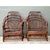 This striking pair of vintage high back Brighton rattan lounge chairs showcases an intricate lattice design that speaks to...