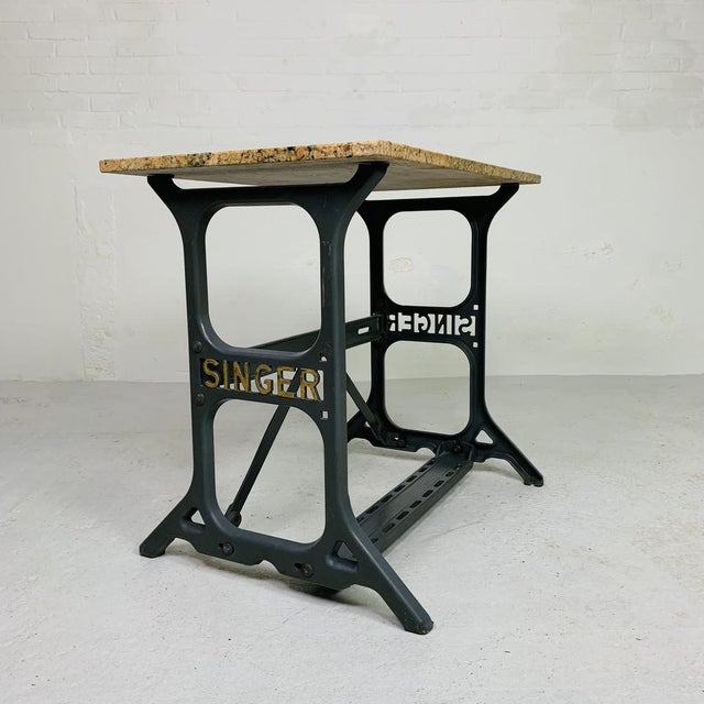 This table can easily be moved in 2 stages. The marble top is loose on the cast iron frame. Height: 74 cm. Width: 87 cm....